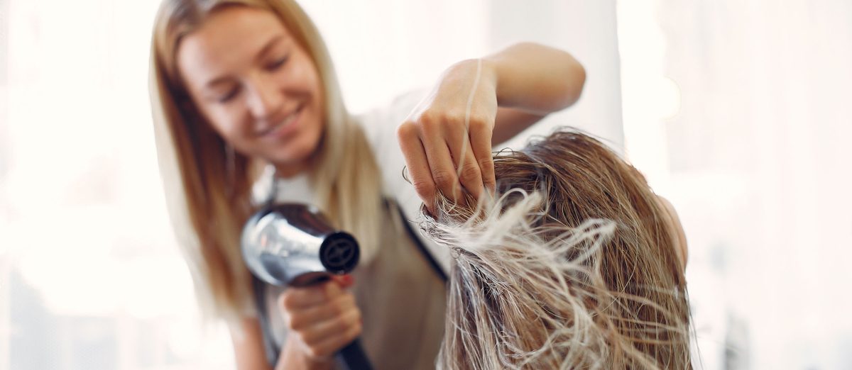 woman-drying-hair-hairsalon
